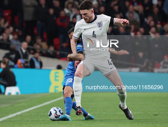 L-R Manolis Siopis of Greece, from Cardiff City, takes on Declan Rice of England, from Arsenal, during the UEFA Nations League Group 2 match...