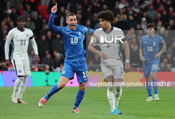 Dimitris Pelkas of Istanbul Basaksehir, Greece, and Rico Lewis of Manchester City, England, are in action during the UEFA Nations League Gro...