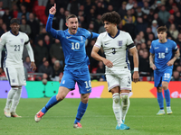 Dimitris Pelkas of Istanbul Basaksehir, Greece, and Rico Lewis of Manchester City, England, are in action during the UEFA Nations League Gro...