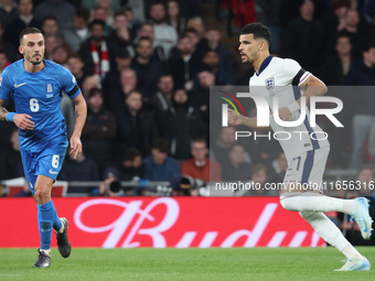 L-R Dimitris Kourbelis of Al-Khaleej, Greece, and Dominic Solanke of Tottenham Hotspur, England, are in action during the UEFA Nations Leagu...