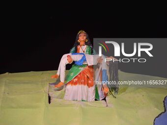 A community 'puja pandal' themed on ''justice for RG Kar rape and murder incident'' during the Durga Puja festival in Nagaon district, Assam...