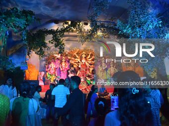 A community 'puja pandal' themed on ''Destroy Nature'' during the Durga Puja festival in Nagaon district, Assam, India, on October 11, 2024....