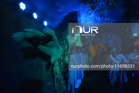 A community 'puja pandal' themed on ''Destroy Nature'' during the Durga Puja festival in Nagaon district, Assam, India, on October 11, 2024....