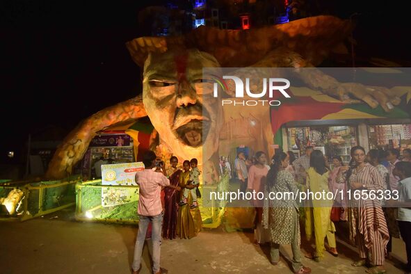 A community 'puja pandal' themed on ''Destroy Nature'' during the Durga Puja festival in Nagaon district, Assam, India, on October 11, 2024....