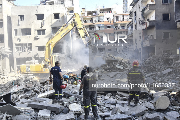 This picture shows the destruction at the site of an Israeli air strike in the Basta area, in Beirut, Lebanon, on October 11, 2024, amid the...