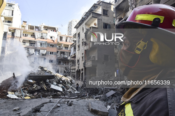 This picture shows the destruction at the site of an Israeli air strike in the Basta area, in Beirut, Lebanon, on October 11, 2024, amid the...