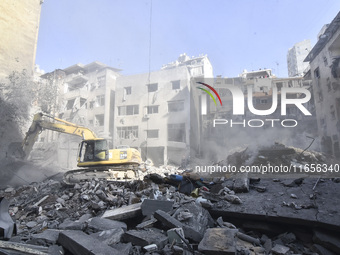 This picture shows the destruction at the site of an Israeli air strike in the Basta area, in Beirut, Lebanon, on October 11, 2024, amid the...