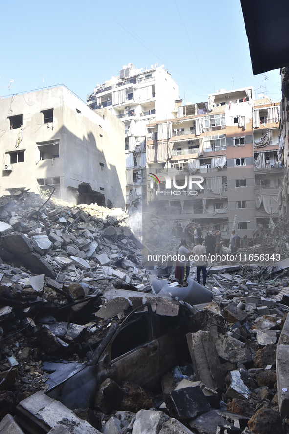 This picture shows the destruction at the site of an Israeli air strike in the Basta area, in Beirut, Lebanon, on October 11, 2024, amid the...