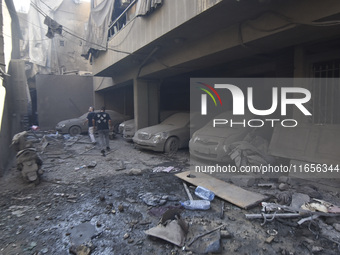 This picture shows the destruction at the site of an Israeli air strike in the Basta area, in Beirut, Lebanon, on October 11, 2024, amid the...