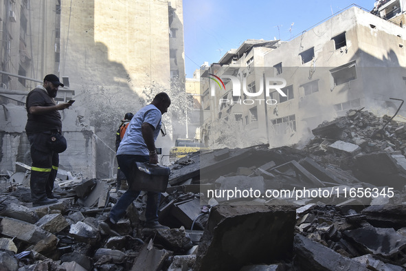 This picture shows the destruction at the site of an Israeli air strike in the Basta area, in Beirut, Lebanon, on October 11, 2024, amid the...