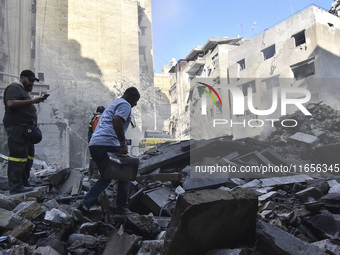 This picture shows the destruction at the site of an Israeli air strike in the Basta area, in Beirut, Lebanon, on October 11, 2024, amid the...