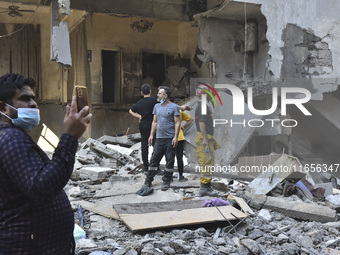 This picture shows the destruction at the site of an Israeli air strike in the Basta area, in Beirut, Lebanon, on October 11, 2024, amid the...