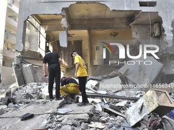 This picture shows the destruction at the site of an Israeli air strike in the Basta area, in Beirut, Lebanon, on October 11, 2024, amid the...