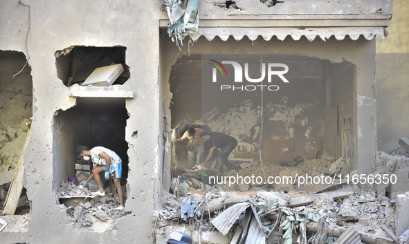 This picture shows the destruction at the site of an Israeli air strike in the Basta area, in Beirut, Lebanon, on October 11, 2024, amid the...