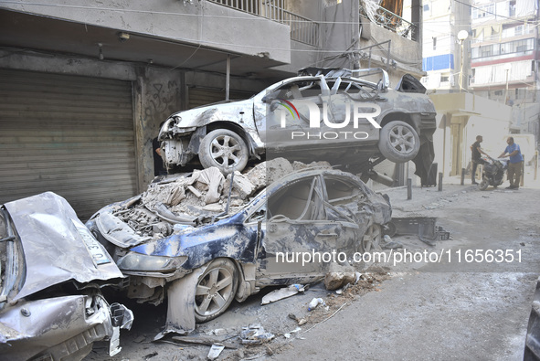 This picture shows the destruction at the site of an Israeli air strike in the Basta area, in Beirut, Lebanon, on October 11, 2024, amid the...