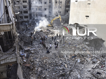 This picture shows the destruction at the site of an Israeli air strike in the Basta area, in Beirut, Lebanon, on October 11, 2024, amid the...