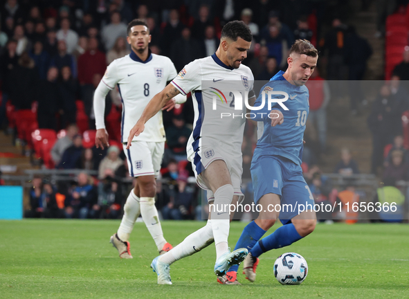 Dimitris Pelkas of Istanbul Basaksehir, Greece, holds off Dominic Solanke of Tottenham Hotspur, England, during the UEFA Nations League Grou...