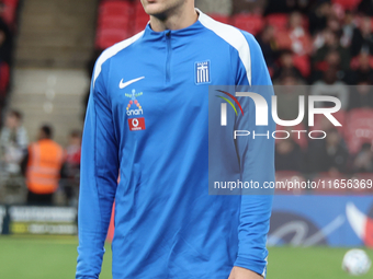 Panaglotis Retsos of Greece participates in the pre-match warm-up during the UEFA Nations League Group 2 match between England and Greece at...