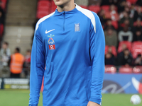 Panaglotis Retsos of Greece participates in the pre-match warm-up during the UEFA Nations League Group 2 match between England and Greece at...