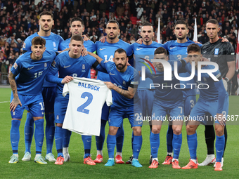 The Greece team poses for a photo. In the back row are Ninos Mavropanos (West Ham United), Tasos Bakasetas (Panathinaikos), Vangelis Pavlidi...