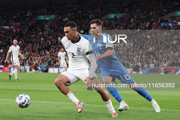 L-R Trent Alexander-Arnold of England holds off Tasos Bakasetas of Greece during the UEFA Nations League Group 2 match between England and G...