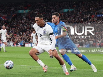 L-R Trent Alexander-Arnold of England holds off Tasos Bakasetas of Greece during the UEFA Nations League Group 2 match between England and G...