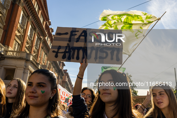 Protesters participate in the climate protest ''Fridays For Future'' in Turin, Italy, on October 11, 2024. The Fridays for the Future moveme...