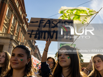 Protesters participate in the climate protest ''Fridays For Future'' in Turin, Italy, on October 11, 2024. The Fridays for the Future moveme...