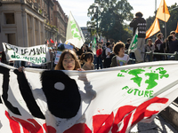 Protesters participate in the climate protest ''Fridays For Future'' in Turin, Italy, on October 11, 2024. The Fridays for the Future moveme...