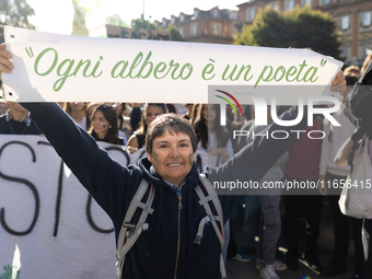 Protesters participate in the climate protest ''Fridays For Future'' in Turin, Italy, on October 11, 2024. The Fridays for the Future moveme...