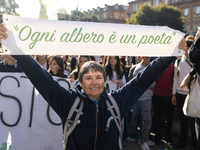 Protesters participate in the climate protest ''Fridays For Future'' in Turin, Italy, on October 11, 2024. The Fridays for the Future moveme...