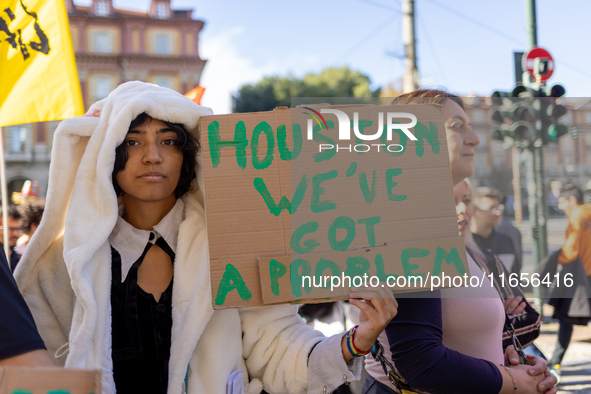 Protesters participate in the climate protest ''Fridays For Future'' in Turin, Italy, on October 11, 2024. The Fridays for the Future moveme...