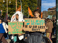 Protesters participate in the climate protest ''Fridays For Future'' in Turin, Italy, on October 11, 2024. The Fridays for the Future moveme...