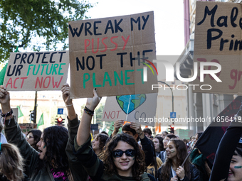 Protesters participate in the climate protest ''Fridays For Future'' in Turin, Italy, on October 11, 2024. The Fridays for the Future moveme...