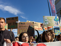 Protesters participate in the climate protest ''Fridays For Future'' in Turin, Italy, on October 11, 2024. The Fridays for the Future moveme...