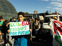 Protesters participate in the climate protest ''Fridays For Future'' in Turin, Italy, on October 11, 2024. The Fridays for the Future moveme...