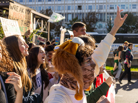 Protesters participate in the climate protest ''Fridays For Future'' in Turin, Italy, on October 11, 2024. The Fridays for the Future moveme...