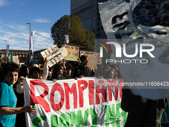 Protesters participate in the climate protest ''Fridays For Future'' in Turin, Italy, on October 11, 2024. The Fridays for the Future moveme...