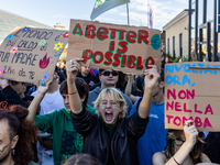 Protesters participate in the climate protest ''Fridays For Future'' in Turin, Italy, on October 11, 2024. The Fridays for the Future moveme...