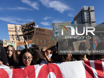 Protesters participate in the climate protest ''Fridays For Future'' in Turin, Italy, on October 11, 2024. The Fridays for the Future moveme...