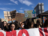 Protesters participate in the climate protest ''Fridays For Future'' in Turin, Italy, on October 11, 2024. The Fridays for the Future moveme...