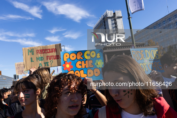 Protesters participate in the climate protest ''Fridays For Future'' in Turin, Italy, on October 11, 2024. The Fridays for the Future moveme...