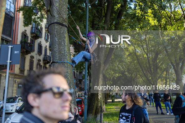 Protesters participate in the climate protest ''Fridays For Future'' in Turin, Italy, on October 11, 2024. The Fridays for the Future moveme...