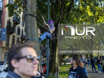 Protesters participate in the climate protest ''Fridays For Future'' in Turin, Italy, on October 11, 2024. The Fridays for the Future moveme...