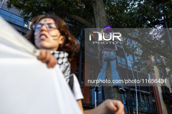 Protesters participate in the climate protest ''Fridays For Future'' in Turin, Italy, on October 11, 2024. The Fridays for the Future moveme...