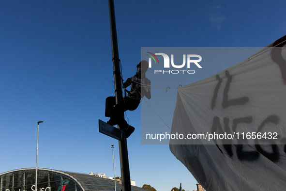 Protesters participate in the climate protest ''Fridays For Future'' in Turin, Italy, on October 11, 2024. The Fridays for the Future moveme...