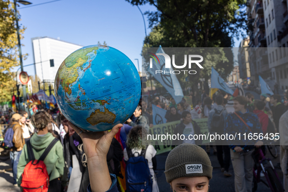 Protesters participate in the climate protest ''Fridays For Future'' in Turin, Italy, on October 11, 2024. The Fridays for the Future moveme...