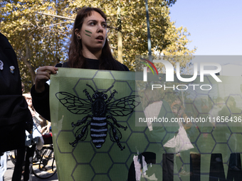 Protesters participate in the climate protest ''Fridays For Future'' in Turin, Italy, on October 11, 2024. The Fridays for the Future moveme...