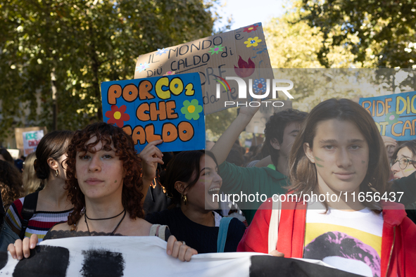 Protesters participate in the climate protest ''Fridays For Future'' in Turin, Italy, on October 11, 2024. The Fridays for the Future moveme...