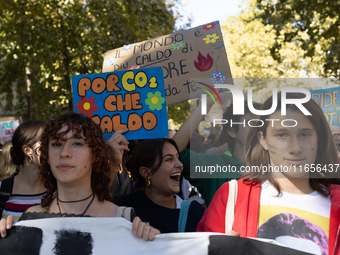 Protesters participate in the climate protest ''Fridays For Future'' in Turin, Italy, on October 11, 2024. The Fridays for the Future moveme...